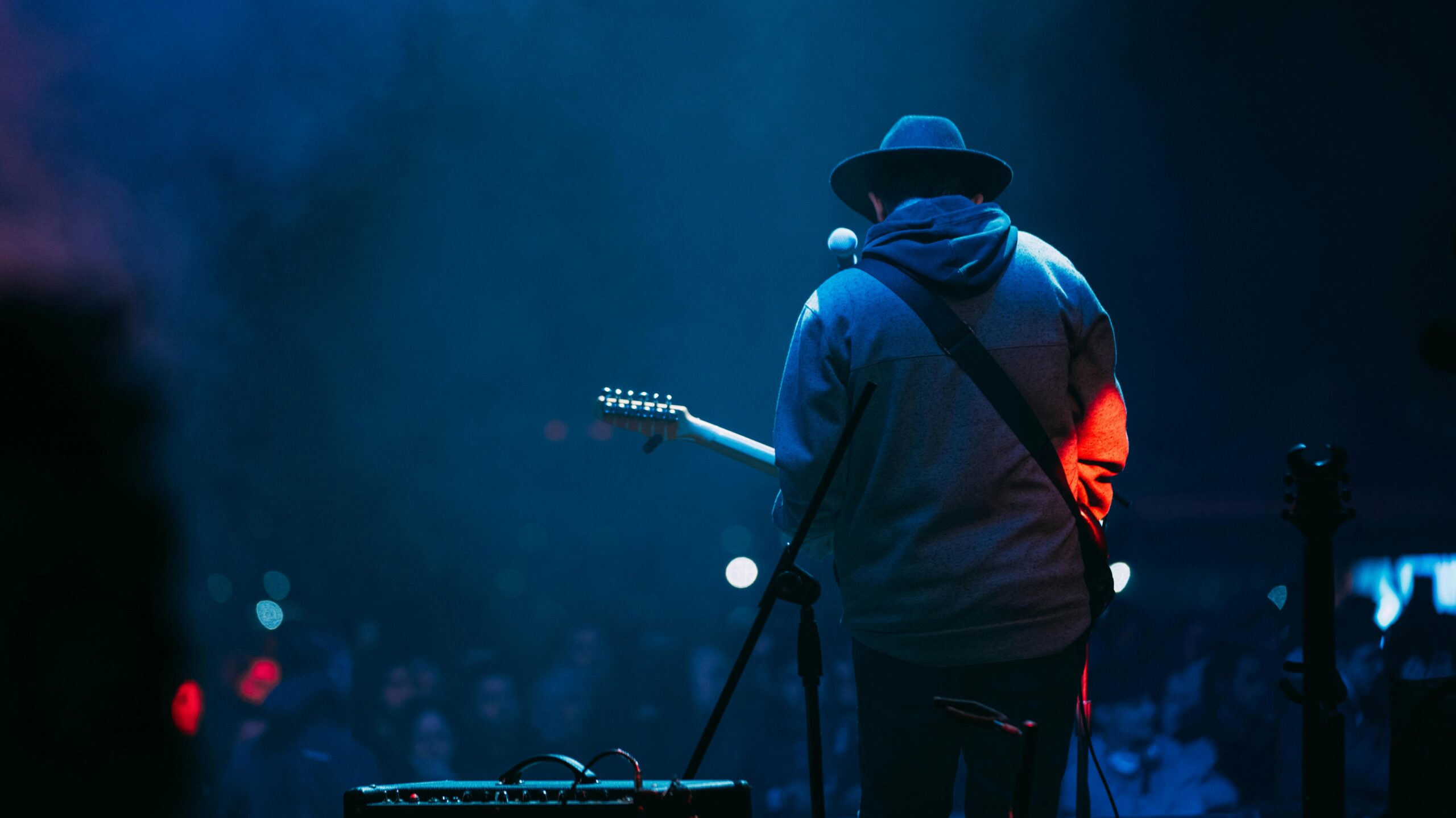 Ayushmann Khurrana performing on stage; Bollywood actor Ayushmann Khurrana smiling; Ayushmann Khurrana in Vicky Donor movie scene